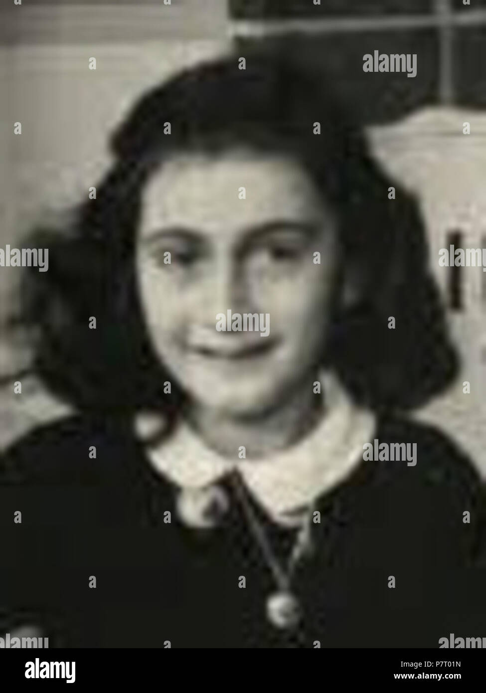 English: Anne Frank in 1940, while at 6. Montessori school, Niersstrraat 41-43, Amsterdam (the Netherlands). Cropped version for using in collages etc. 1940 23 AnneFrankSchoolPhoto cropped Stock Photo