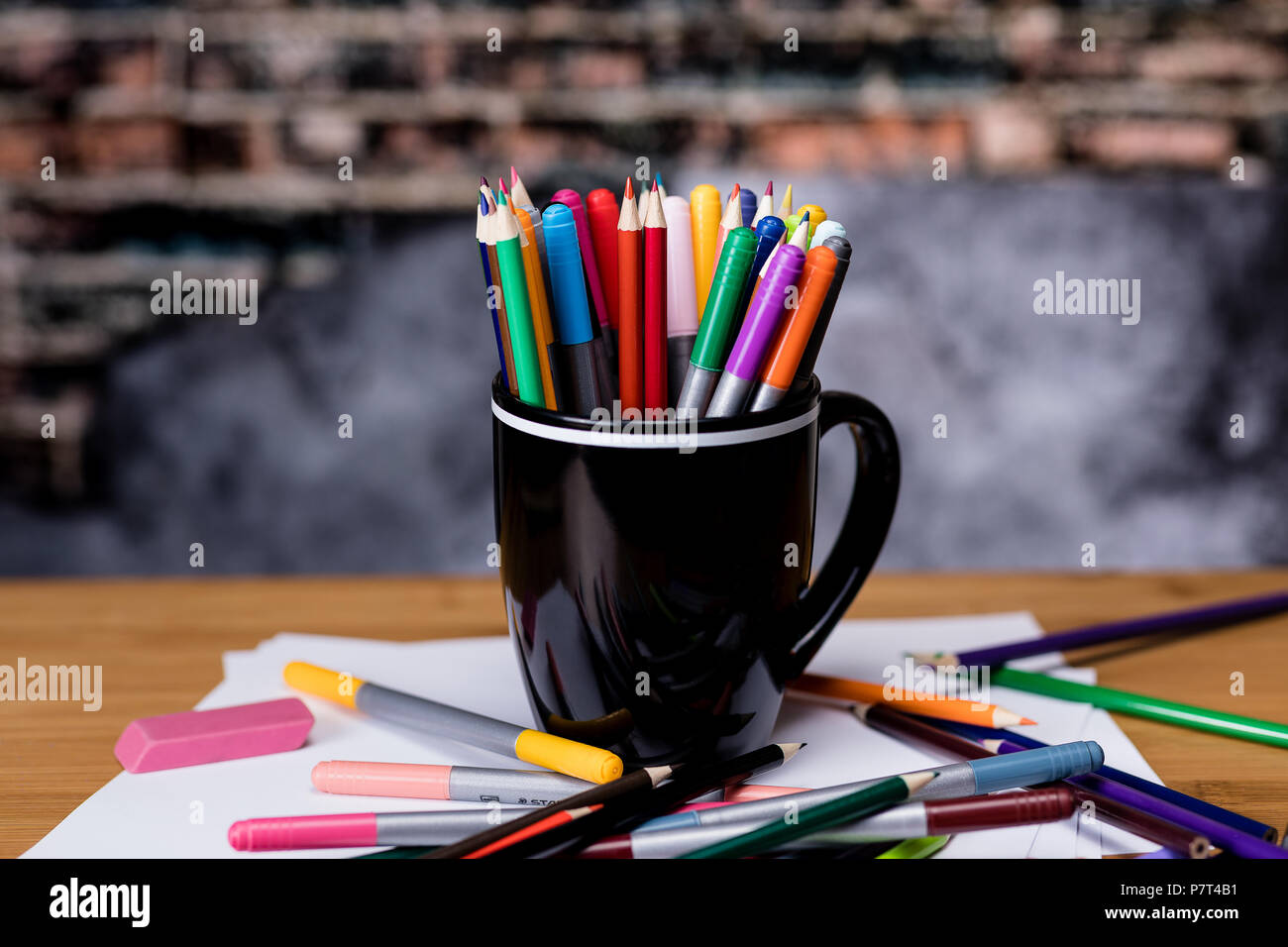 Colored pencils and markers against each other Stock Photo by ©Popoudina  81852286