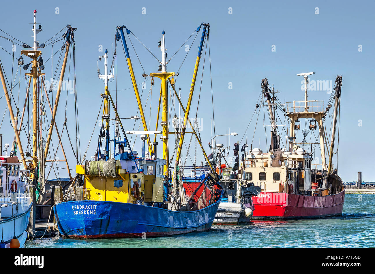 Breskens, The Netherlands, July 2nd, 2018: Several fishing boats in the harbour on a sunny summer evening Stock Photo