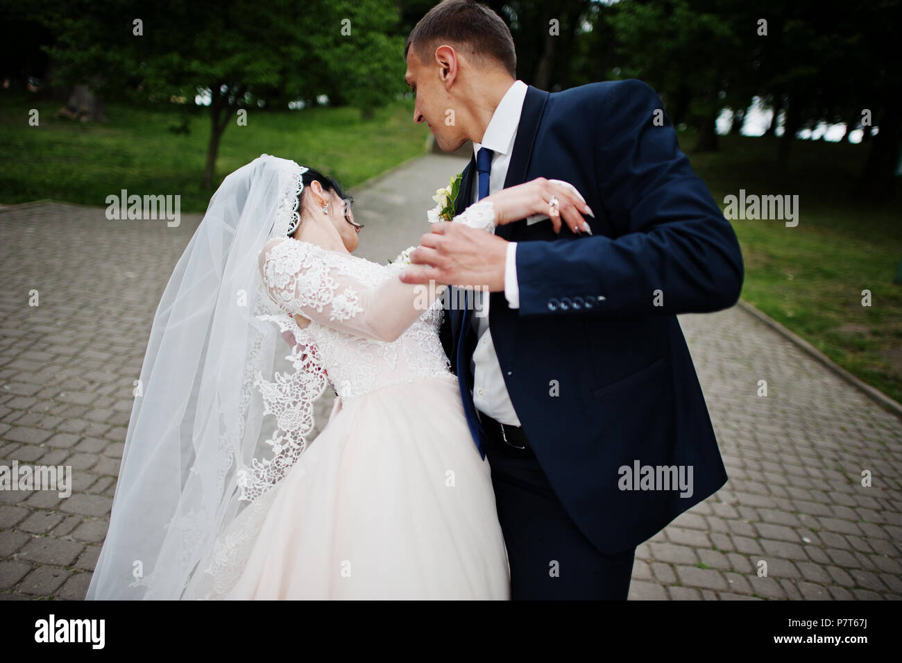 Newly married couple kissing in hi-res stock photography and images - Alamy