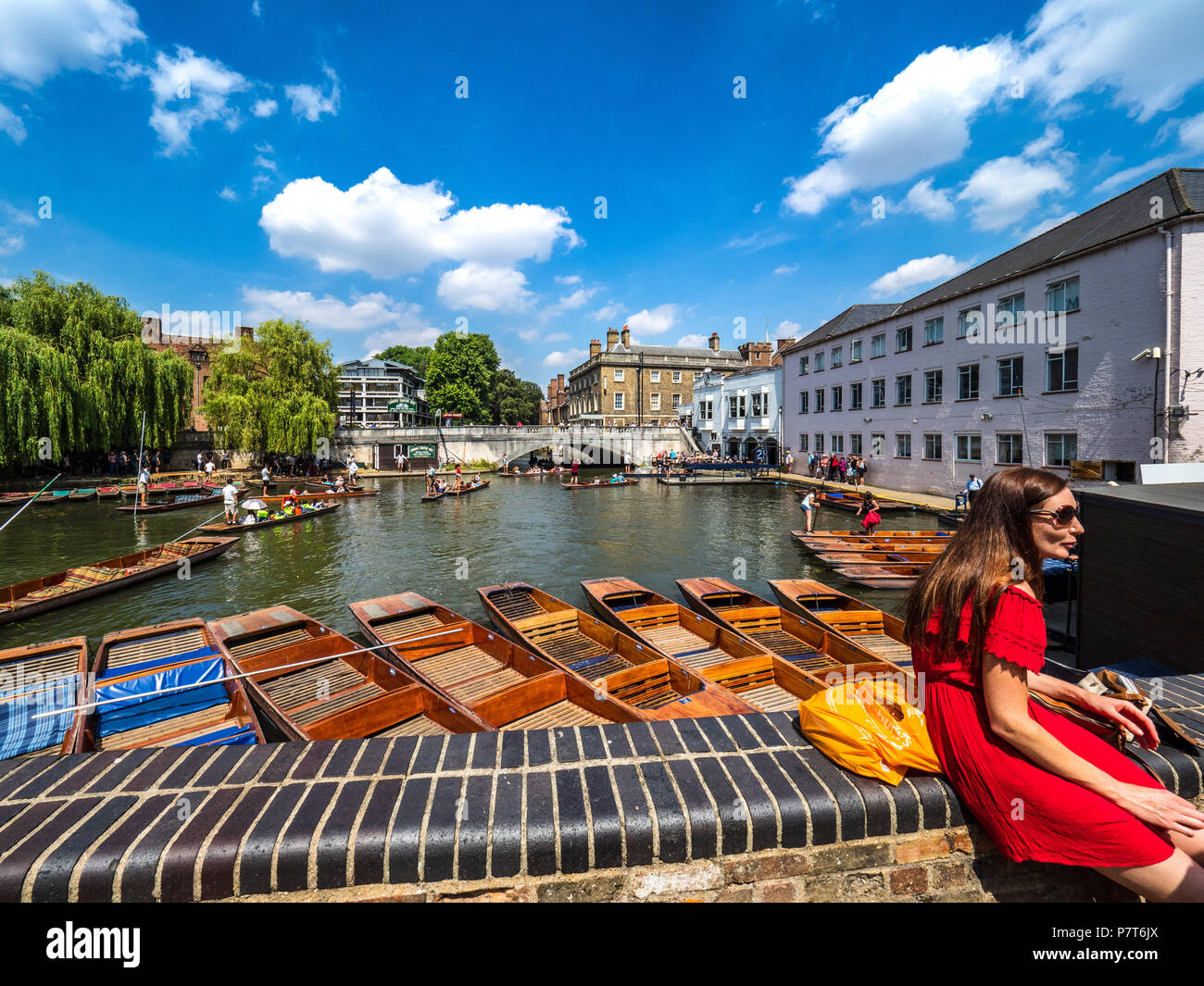 Cambridge Tourism - Punts waiting for hire on a warm summer day. Summer in Cambridge. Stock Photo