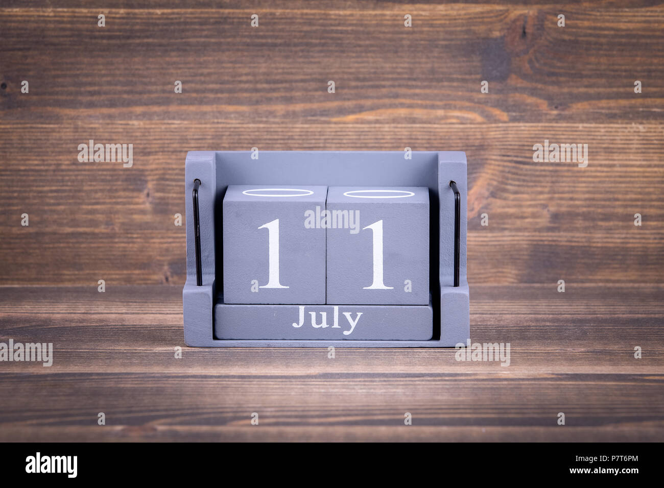 11 July World Population Day. Wooden, square calendar. business trip or holiday planning background Stock Photo