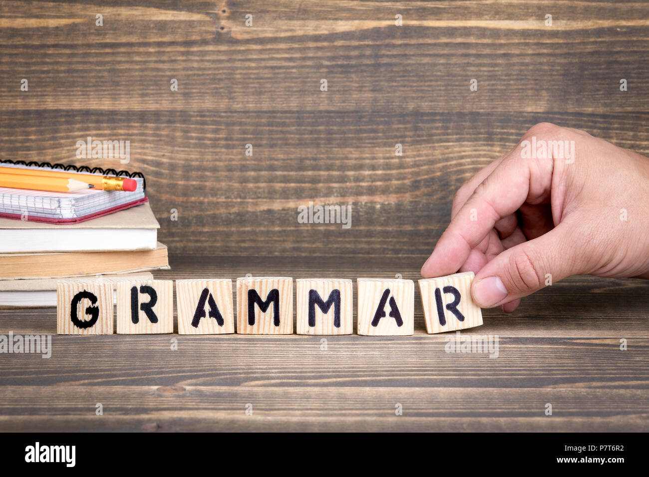 grammar. Language, knowledge and selfeducation concept. Wooden letters