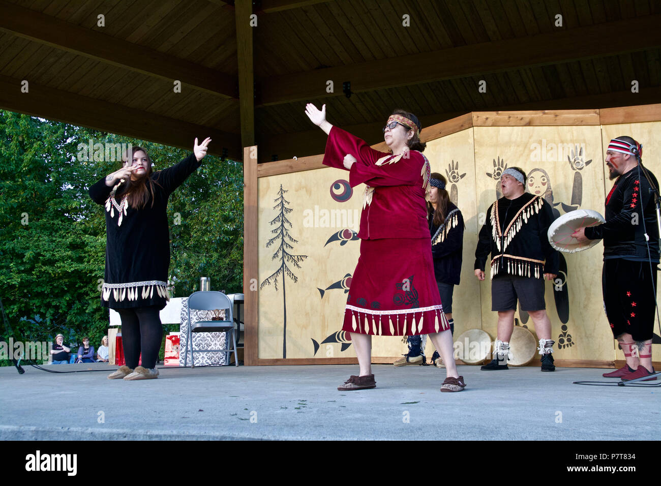 Aboriginal performers recreate traditional dances by their ancestors on the Rocky Point Pier on National Indigenous People's Day 2018, Port Moody, BC Stock Photo