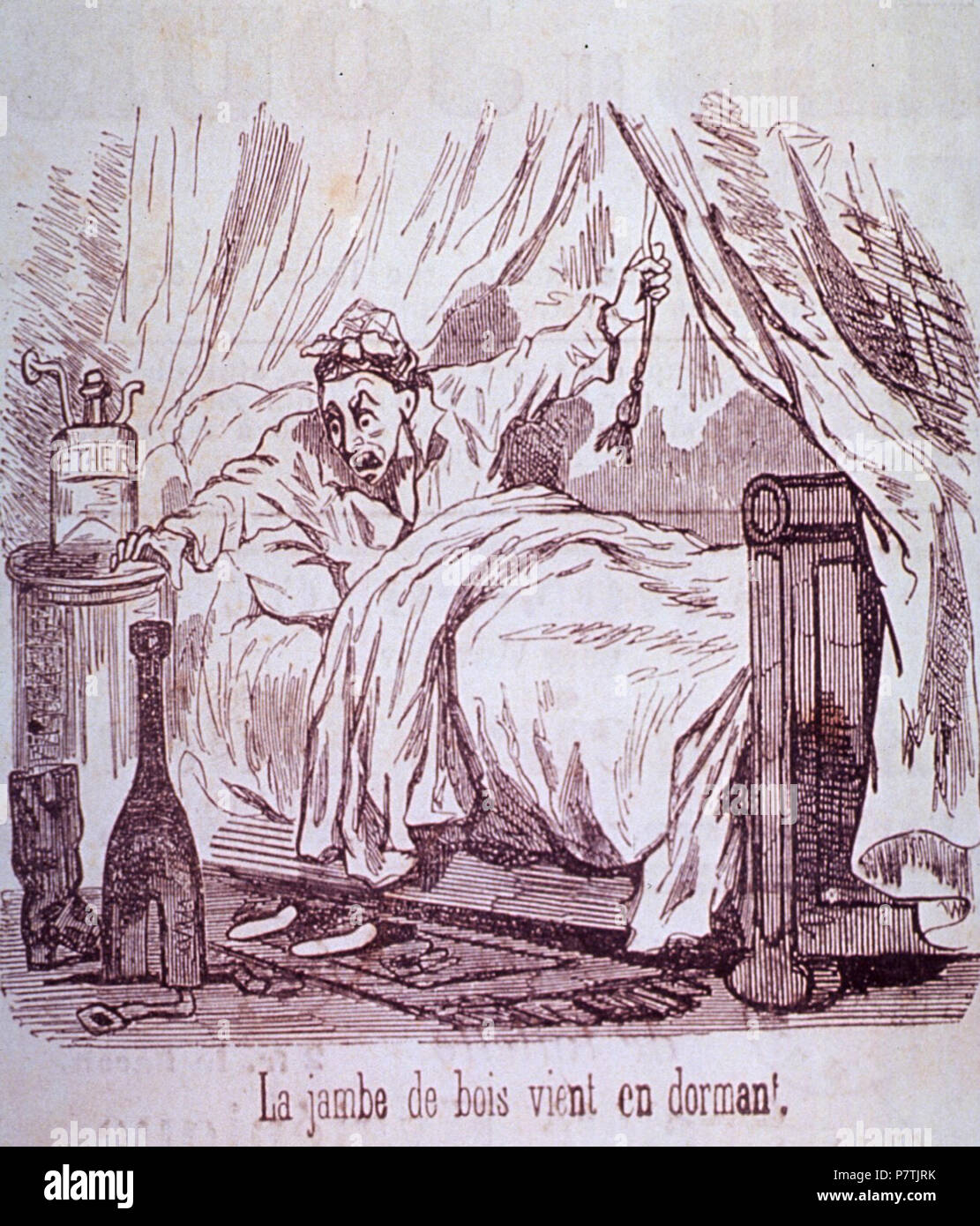 La Jambe de bois vient en dormant A man in bed, with an ether bottle nearby, is startled when he discovers a wooden leg in place of one of his boots. circa 1847 27 Artificial leg caricature Stock Photo