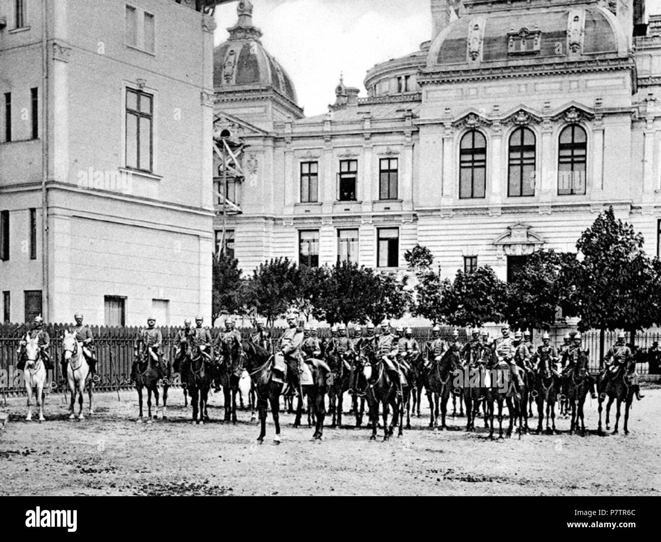 English: Back view of the CEC Palace and the royal guard. Source and author Author:   Alexandru Antoniu  (1860–1925)    Description Romanian photographer  Date of birth/death circa 1860 1925  Work period 1890–1904  Work location Bucharest  Authority control  : Q33132969    Source: Album general al României - compus din 300 tablouri reprezentând monumentele istorice i contimporane, posiiuni pitoresci, Domeniul Coroanei i costume naionale cu descrierea istoric i pitoreasc, Dresden: C.G.Räder, 1901-1904  This is a photo of a historic monument in Bucureti, classified with number B-II-m-A-19845  .  Stock Photo