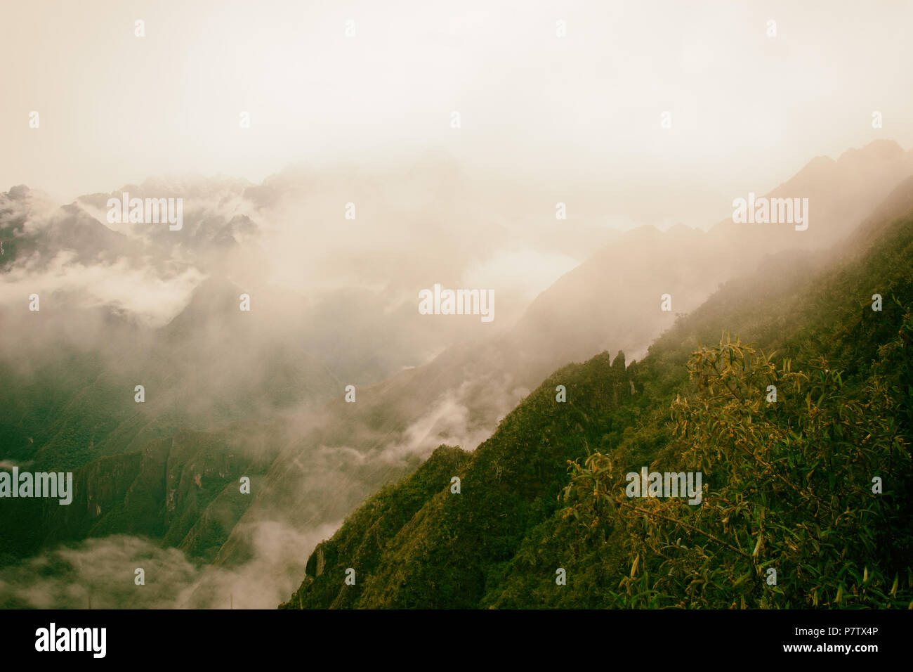 Panoramic Inca Train Panoramic inspirational view of the Andes mountains in mist on the Inca ...