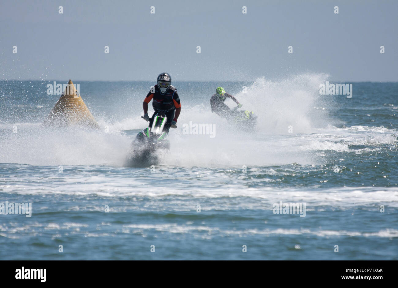 Newton Beach, Porthcawl, Wales, 07 July,2018. Jet Ski raceing at the National race series of high speed, adrenaline-packed P1 Aqua Cross during a glorious summers day. Credit Andrew William Megicks/Alamy Live News Stock Photo