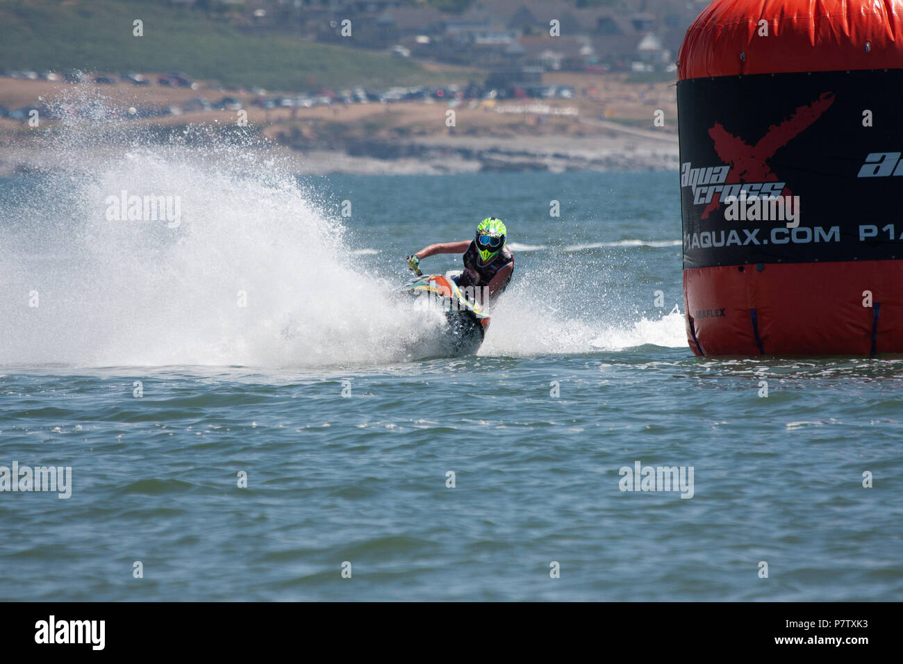 Newton Beach, Porthcawl, Wales, 07 July,2018. Jet Ski raceing at the National race series of high speed, adrenaline-packed P1 Aqua Cross during a glorious summers day. Credit Andrew William Megicks/Alamy Live News Stock Photo