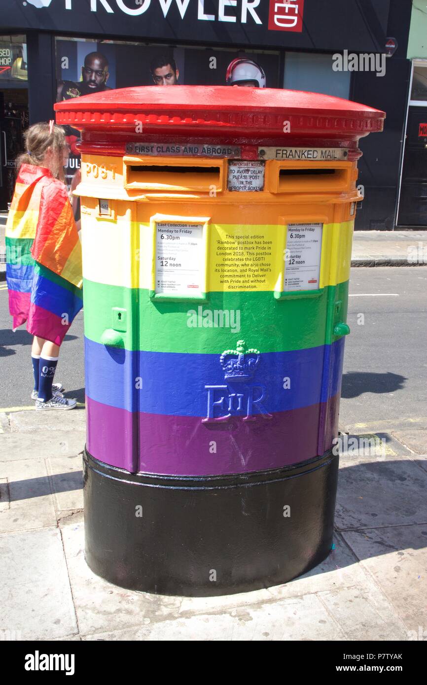 London, UK. 7th July 2018. Pride celebrations in London. A rainbow British postbox on Brewer street, Soho to celebrate Pride in London 2018. It says on it 'This postbox celebrates the LGBTI community, who also chose its location, and the Royal Mail's commitment to Deliver with pride and without discrimination'. Credit: Dimple Patel/Alamy Live News Stock Photo