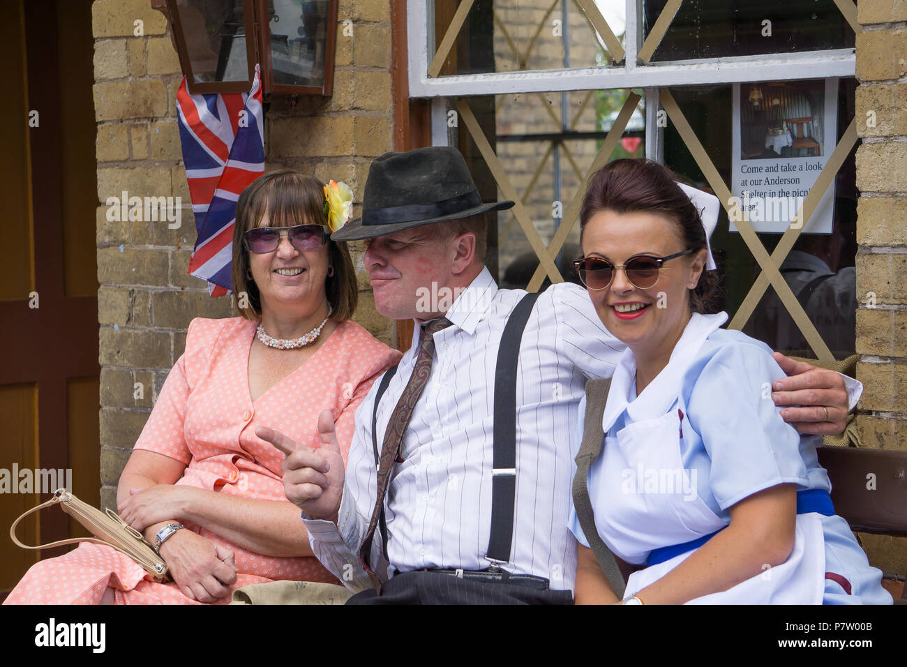 Kidderminster, UK. 7th July, 2018. A journey back in time continues at the Severn Valley Railway as we turn the clock back to the 1940s. Visitors and staff pull out all the stops to ensure a realistic WW2 wartime Britain is experienced by all on this heritage railway line. Civilians and medical staff enjoy the community spirit as folk remember all those that played their part during the 1940s crisis. Credit: Lee Hudson/Alamy Live News Stock Photo