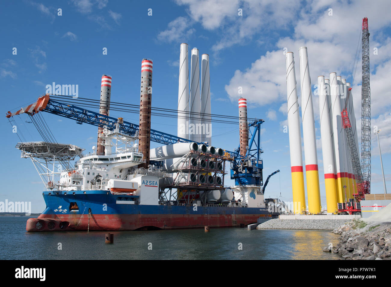 Sassnitz, Germany. 02nd July, 2018. The wind turbine installation vessel SEA CHALLENGER heads out from Mukran Port laden with parts for the Arkona offshore wind farm. Credit: Stefan Sauer/dpa-Zentralbild/dpa/Alamy Live News Stock Photo