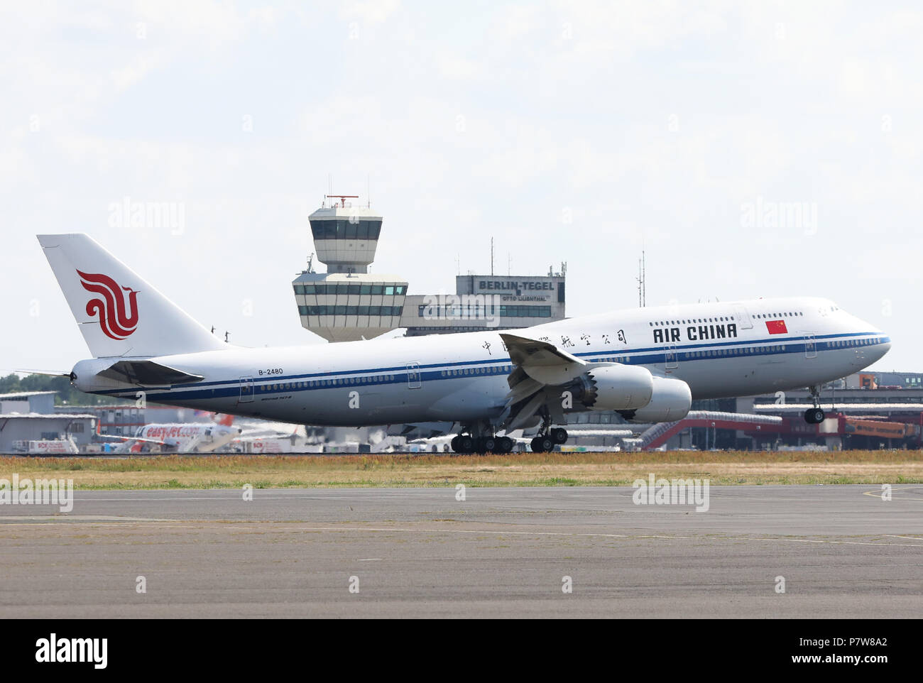 Berlin, Germany. 08th July, 2018. The Air China government plane landing at the military section of Tegel Airport. Li Keqiang, Premier of the People's Republic of China, is in Berlin for the 5th China-Germany Inter-governmental Consultation. Credit: Jörg Carstensen/dpa/Alamy Live News Stock Photo