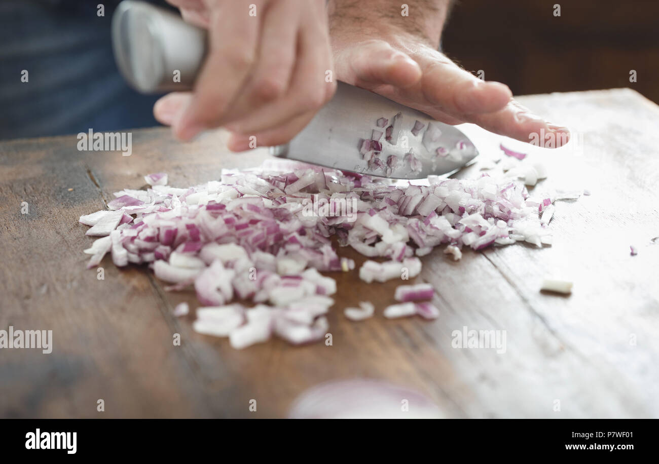 Hands cutting onion chopping close hi-res stock photography and images ...