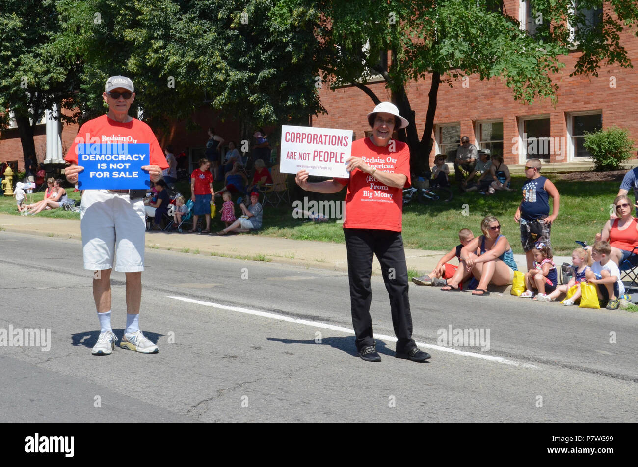 YPSILANTI, MI / USA - JULY 4, 2018:  Representatives of Reclaim Our American Democracy from Big Money march in the Ypsilanti Fourth of July parade. Stock Photo