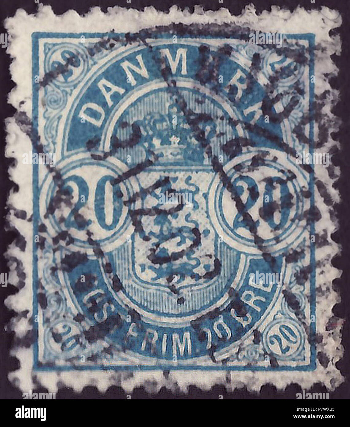 Stamp of the Kingdom of Denmark; 1895; definitive stamp of the issue 'Coat of arms in standing oval with numerals'; new drawing format with perforation spacing; special characteristics: (a) Larger numerals in the corners as in the original issue from 1882; (b) perforation 12¾; c) watermark Denmark No. 2 (Michel: 1Y) (large crown) (d) Longer and more slim legs in the letter 'M' in 'DENMARK' than variant with small numerals in the corner (1882); stamp postmarked in Copenhagen, 1902 Stamp: Michel: No. 36YB; Yvert et Tellier: No. 37a; AFA: No. 36B Color: blue Watermark: Denmark No. 2 (Michel: No.  Stock Photo