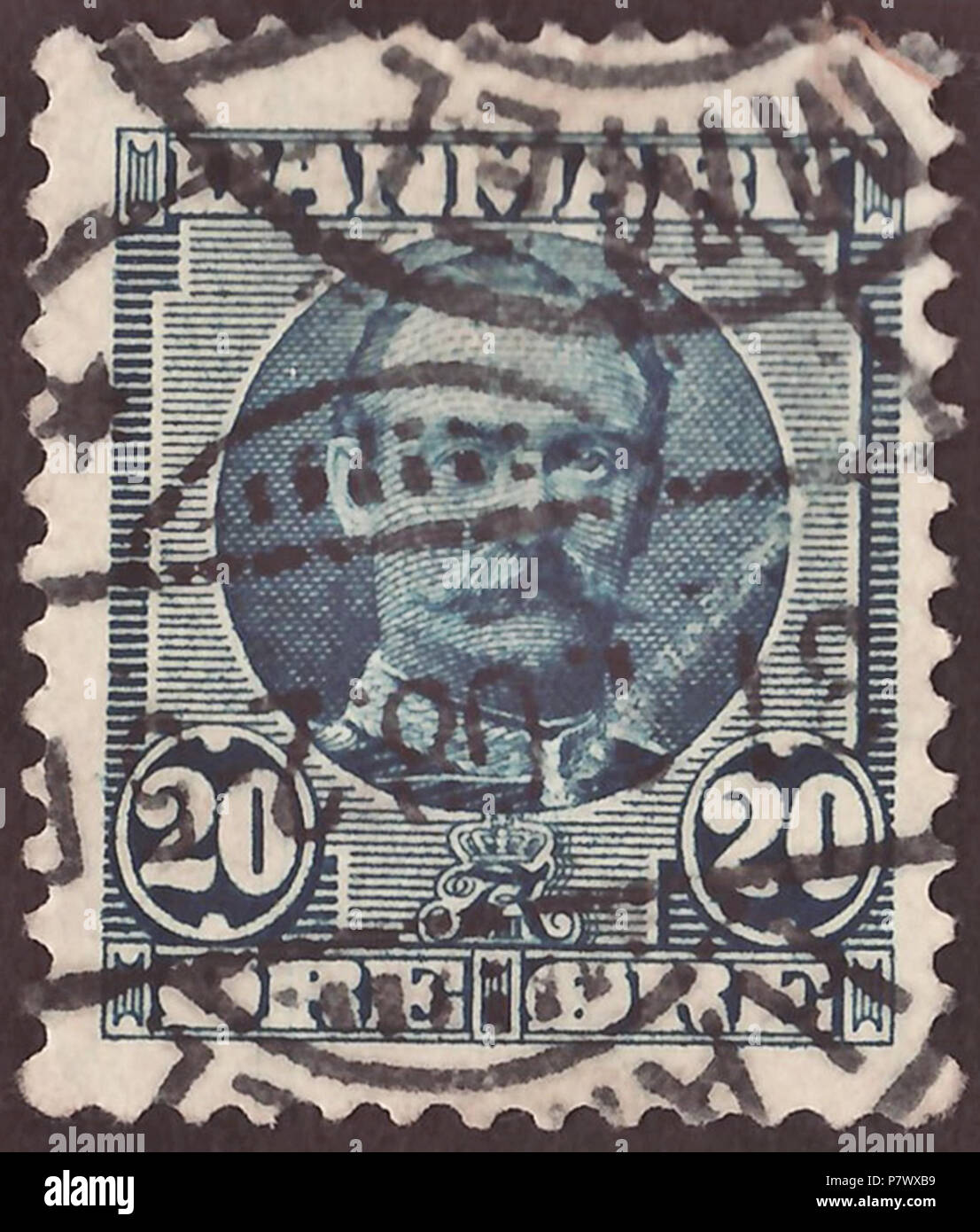 Stamp of the Kingdom of Denmark; 1907; definitive stamp of the issue 'King Frederick VIII of Denmark' (1907 series); postmarked in Hammel (Jutland), 1908 Stamp: Michel: No. 55a; Yvert et Tellier: No. 57; AFA: No. 56 Color: steel blue Watermark: Denmark No. 3 (Michel: No. 1Z) (new (great, oval) crown) Nominal value: 20 Øre Postage validity: from January 1907 until 31 December 1926 Stamp picture size (printed area): 17.5 x 20.0 mm Postmark: Hammel (East Jutland, near Aarhus), 31 December 1908 . January 1907 (first issue of the stamp) 31 December 1908 (date of postmark) 102 DAN 1907 MiNr0055a pm  Stock Photo