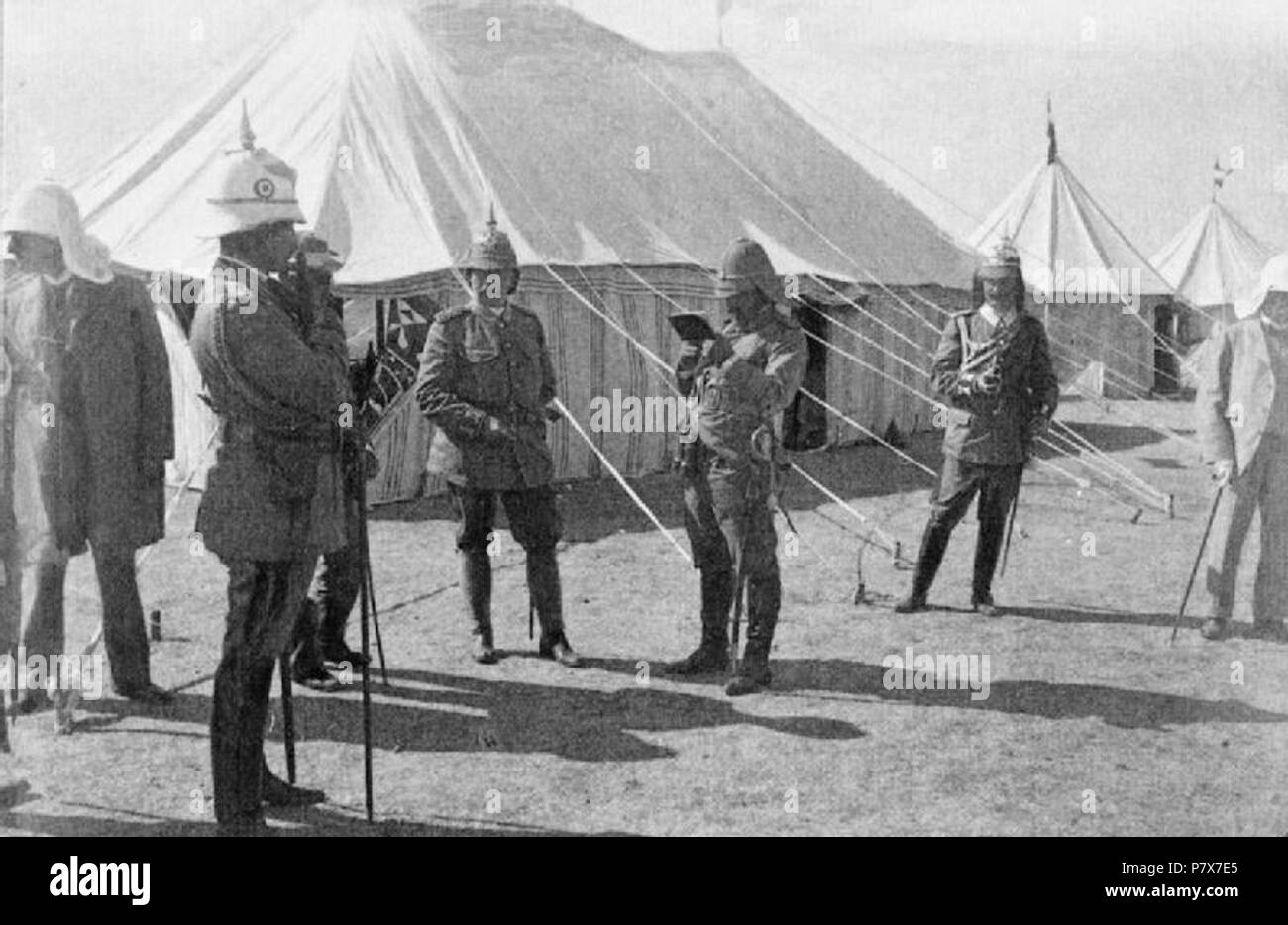 English: Germany Before the First World War 1890 - 1914 The visit of Kaiser Wilhelm II and Kaiserin Auguste to Palestine in 1898. Snapshot taken by the Kaiserin showing the Kaiser and his staff in front of the breakfast tent at their encampment near Tantura, near Haifa, 26 October. Photograph from a personal collection compiled by the Kaiserin and presented by her to Hugh, 5th Earl of Lonsdale. 26 October 1898 172 Germany Before the First World War 1890 - 1914 HU68401 Stock Photo