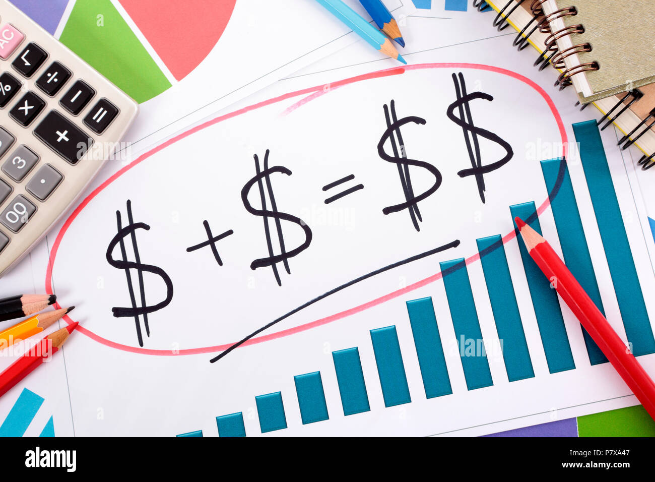Simple savings or retirement formula on bar graph surrounded by calculator,  books and pencils Stock Photo - Alamy