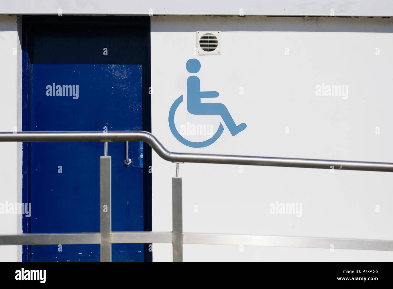 Disabled wheelchair access accessibility sign at toilets wc uk Stock