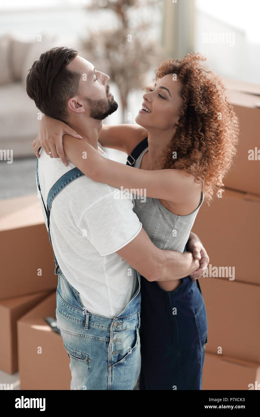 Portrait of a young couple moving into a new home Stock Photo - Alamy