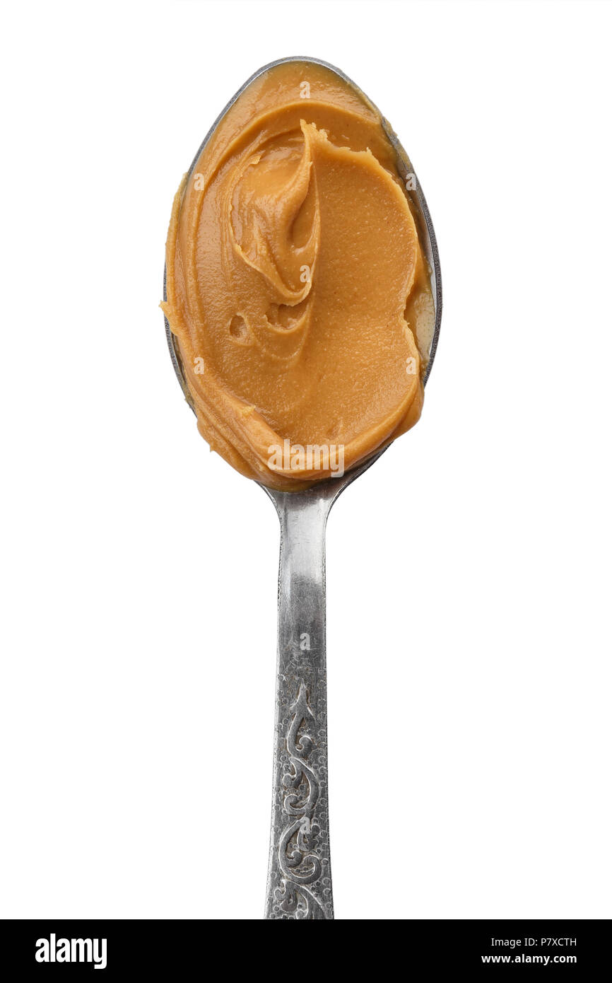 spoon with natural organic peanut butter, on white background, isolated  Stock Photo - Alamy