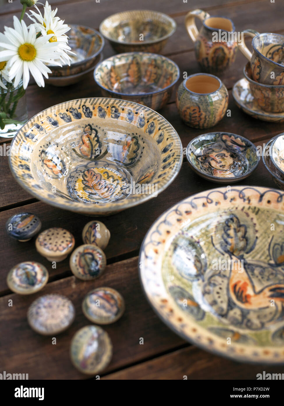 Closeup of pottery bowls and door handles Stock Photo Alamy
