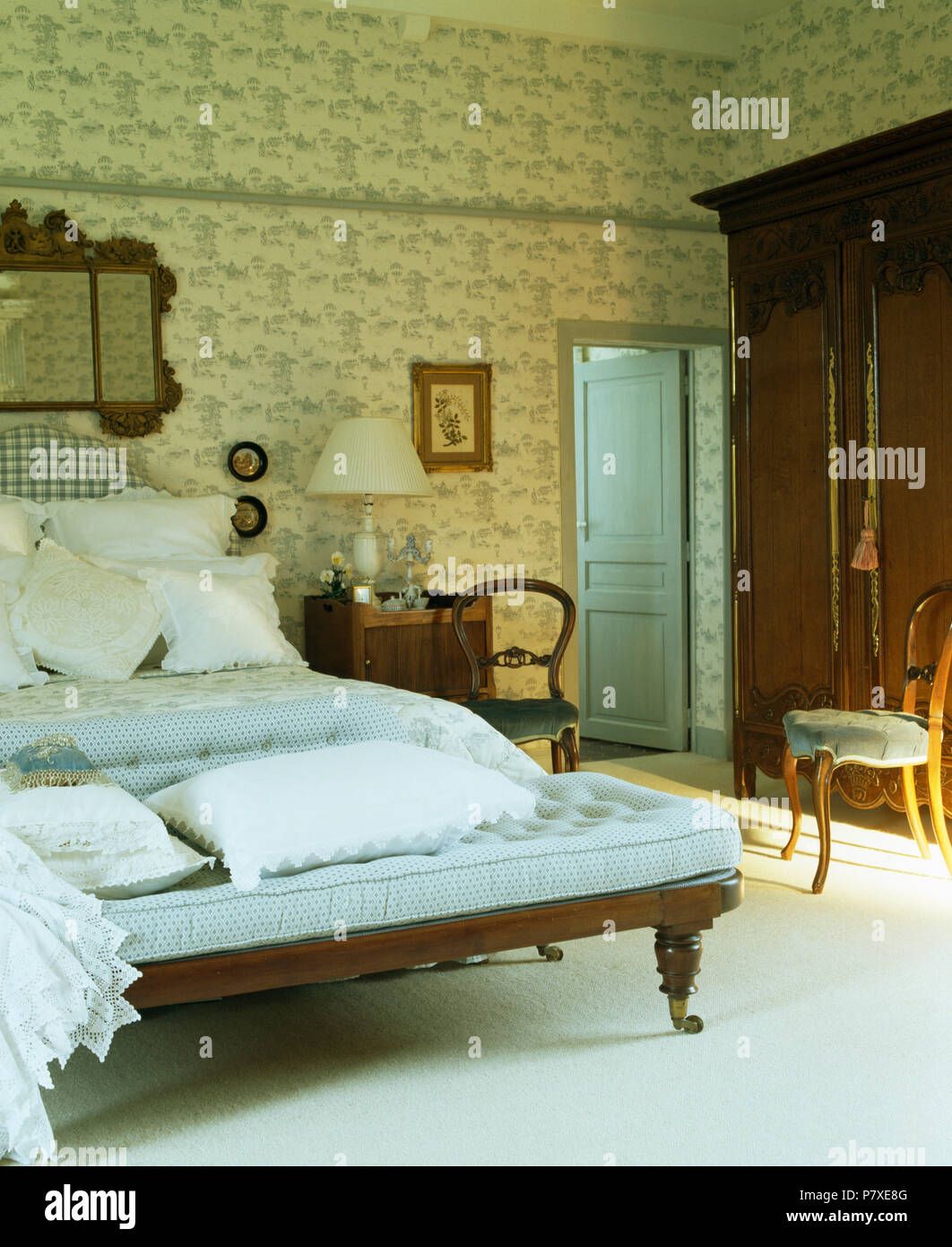 Patterned Cream Wallpaper In Large Country Bedroom With Blue