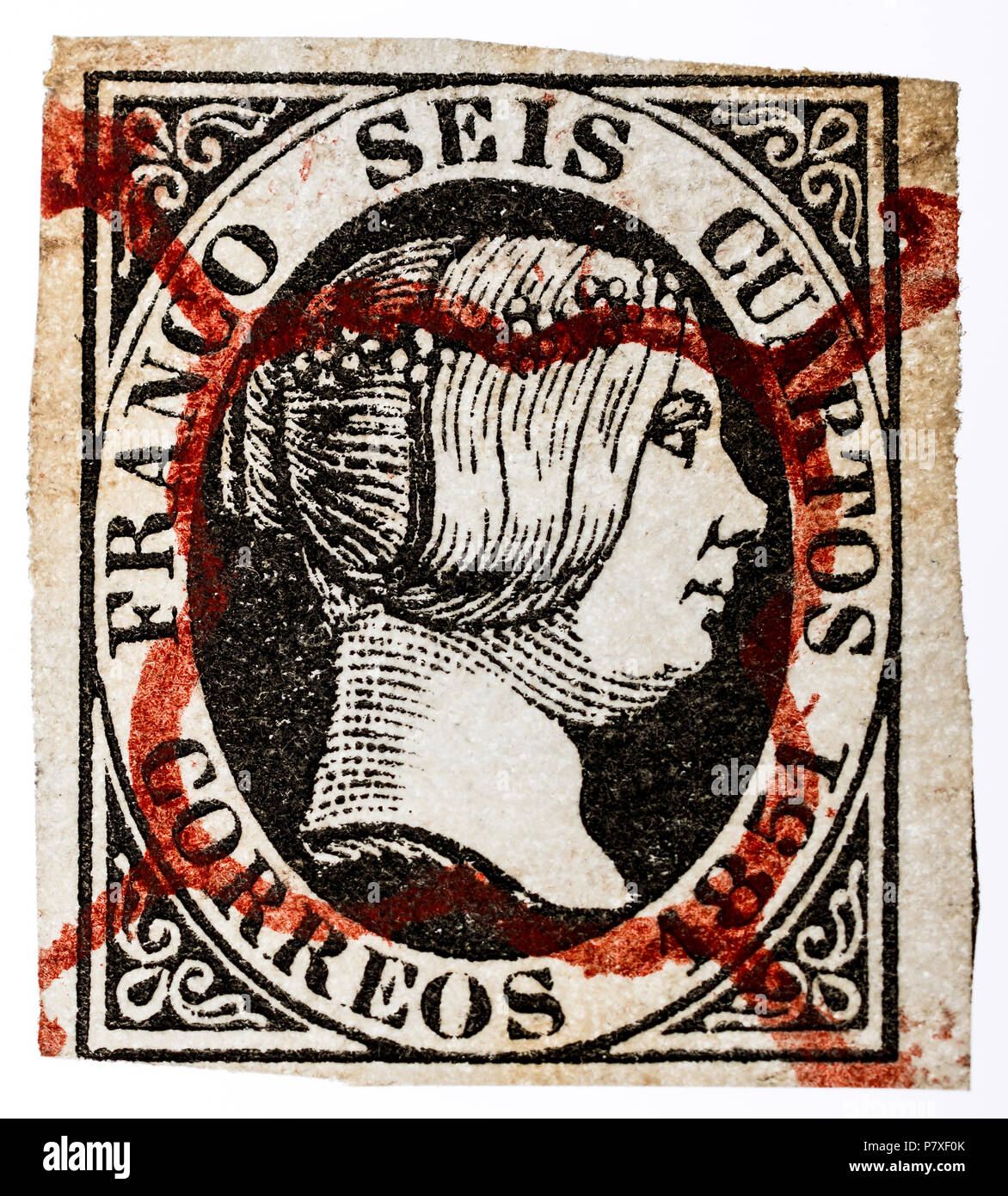 1851 Spanish Queen Isabella II postage stamp with scarce red postmark cancel.. Stock Photo