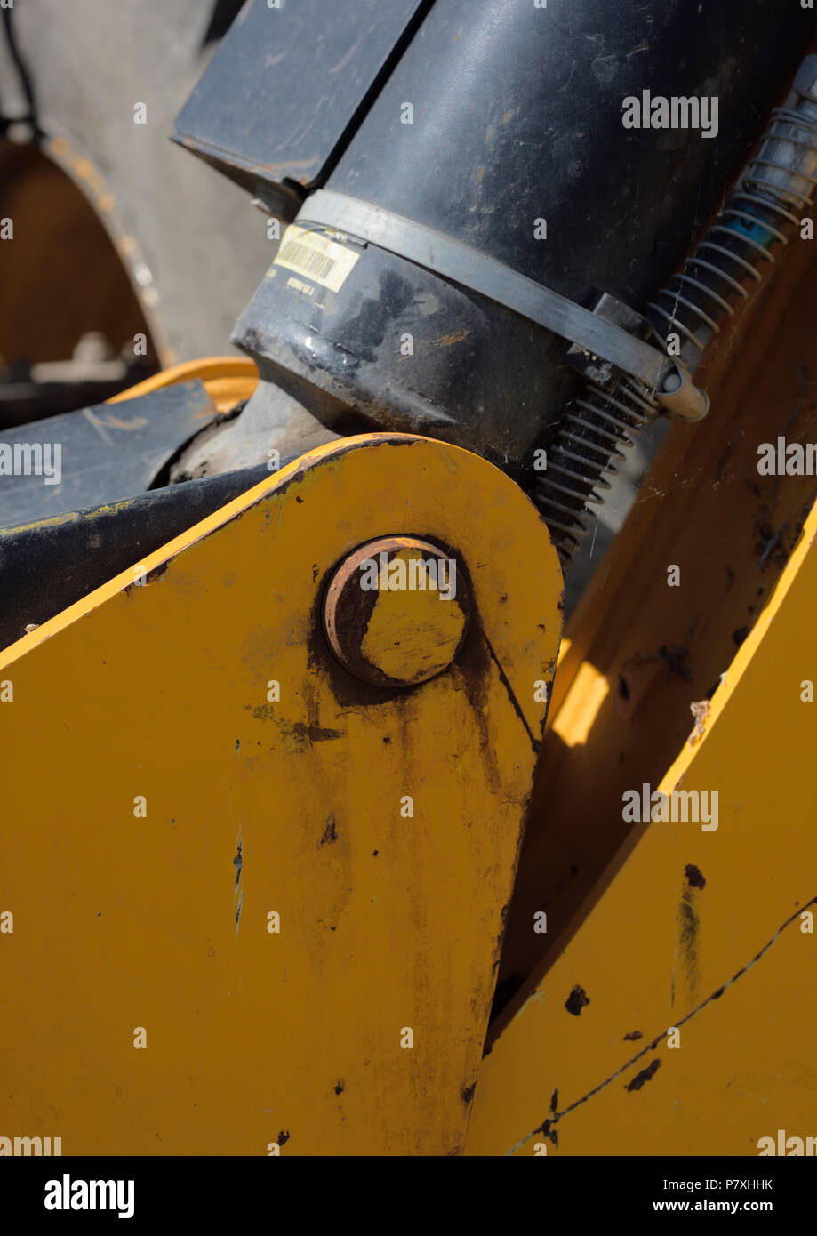 Hydraulic ram pivot point and clevis pin on telehandler Stock Photo Alamy