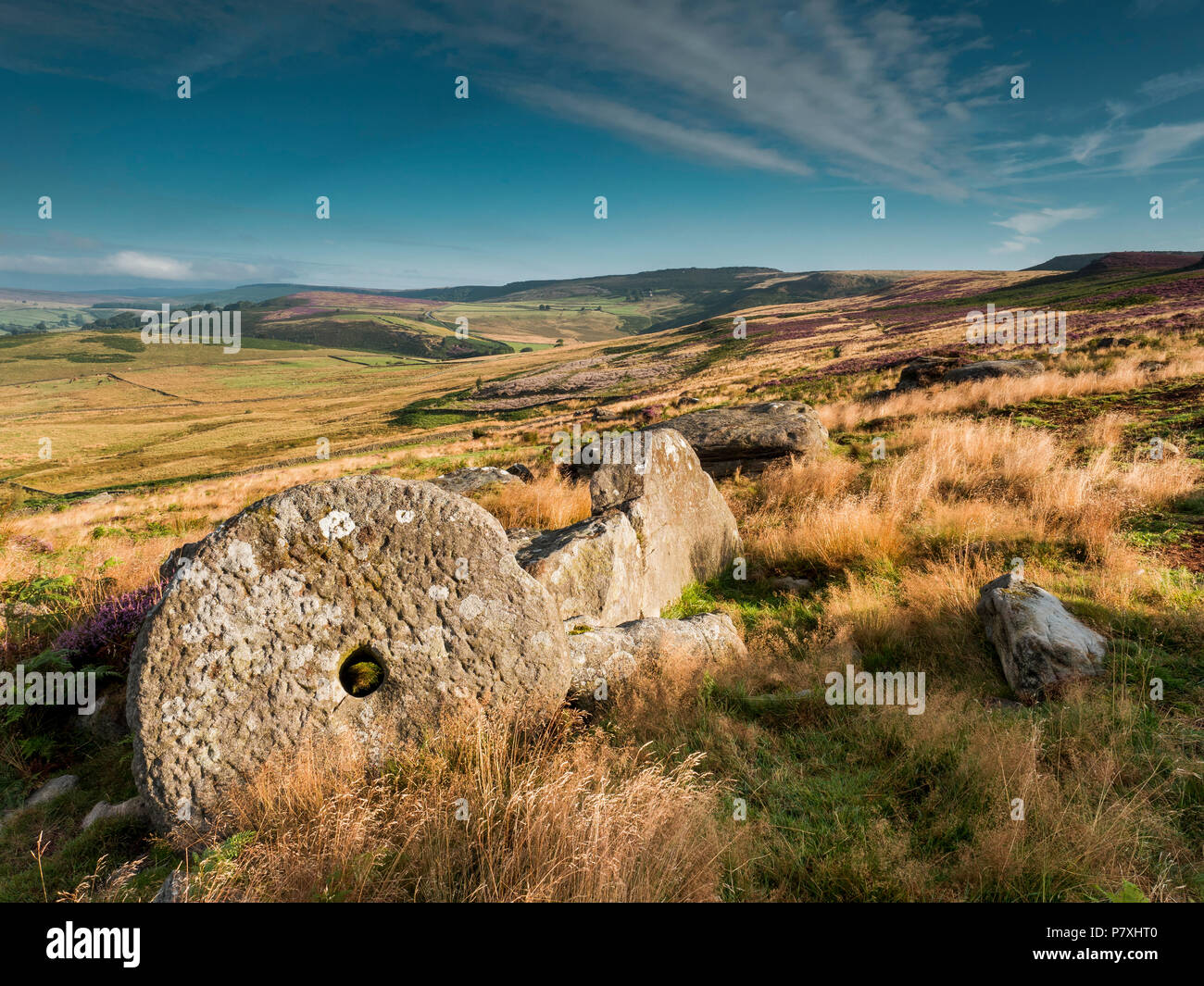 A pair of unfinished millstones in the Derbyshire Dales. Stock Photo