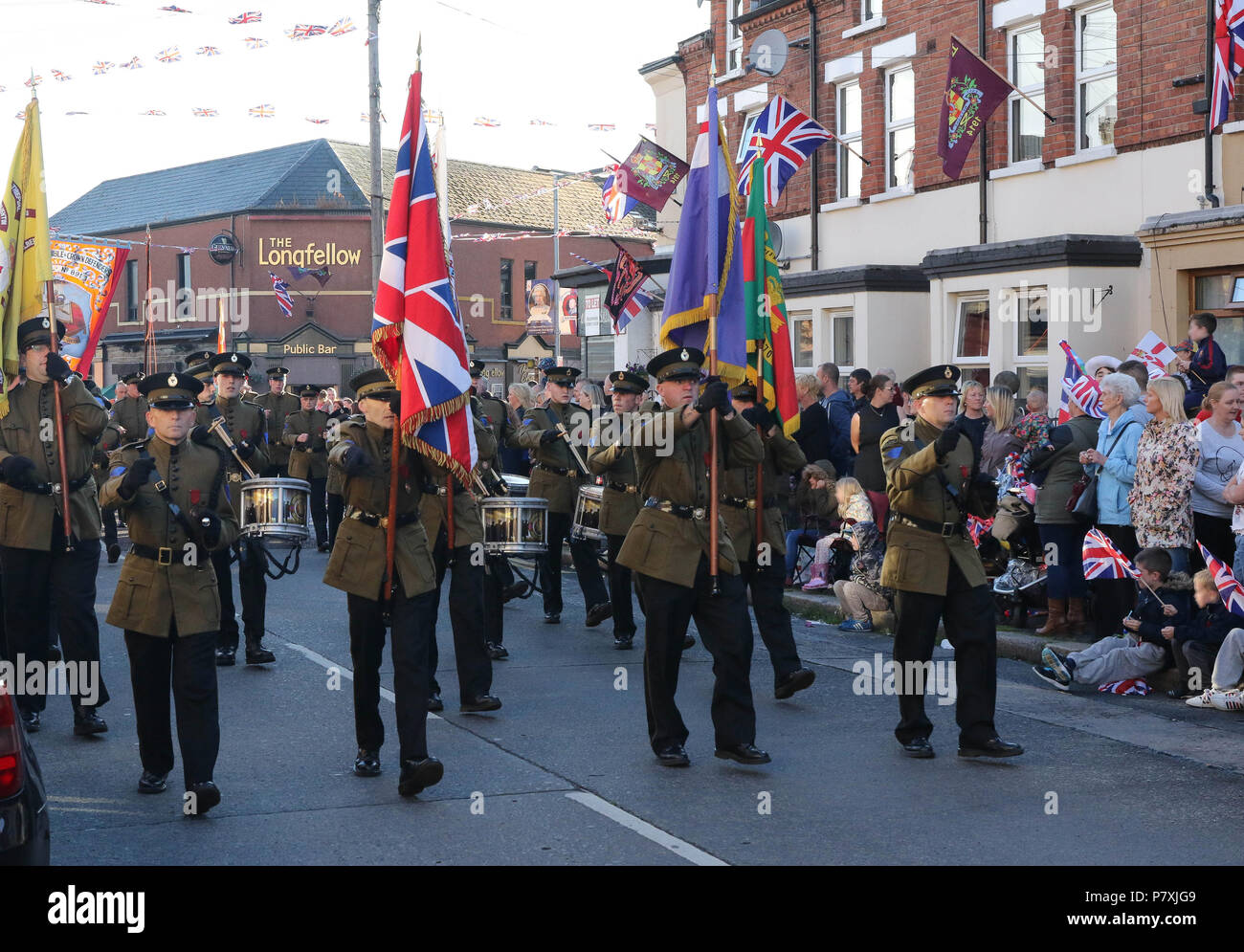 01 July 2016 – Orange Order Parade in Belfast marking the anniversary of the battle of the Somme. This is the Ballymacarrett and No 6 District Parade in east Belfast. Each year throughout Northern Ireland the Orange Order hold a number of parades and church services to mark the anniversary of the Battle of the Somme given its immense impact back then on the province  - lodges and bands parade watched by large crowds each year. Stock Photo