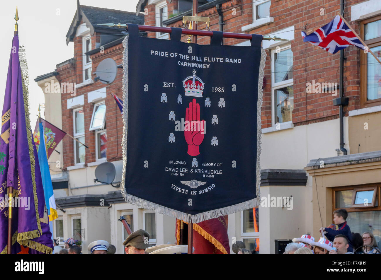 01 July 2016 – Orange Order Parade in Belfast marking the anniversary of the battle of the Somme. This is the Ballymacarrett and No 6 District Parade in east Belfast. Each year throughout Northern Ireland the Orange Order hold a number of parades and church services to mark the anniversary of the Battle of the Somme given its immense impact back then on the province  - lodges and bands parade watched by large crowds each year. Stock Photo