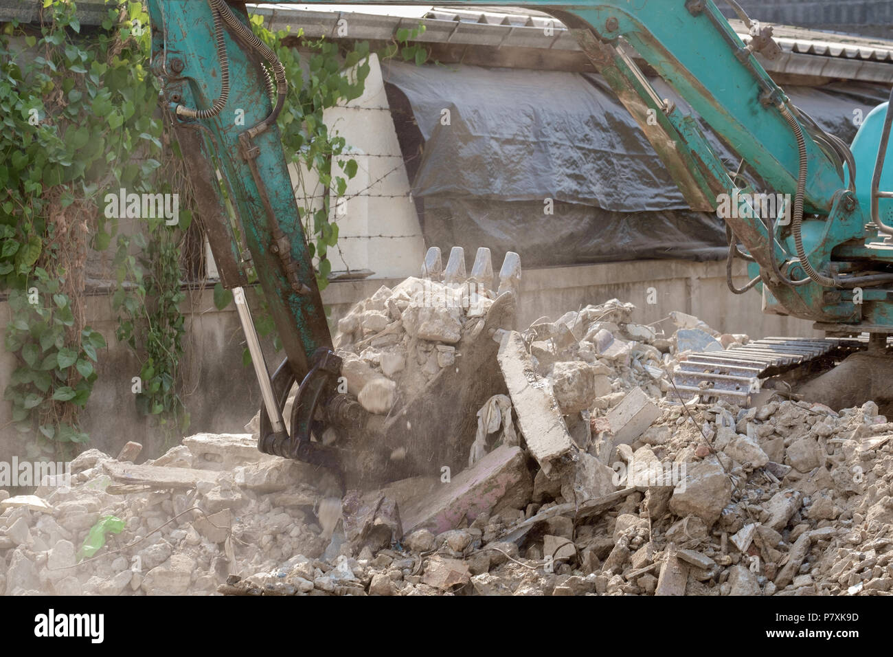 View of shovel of excavator machine working in construction site ...