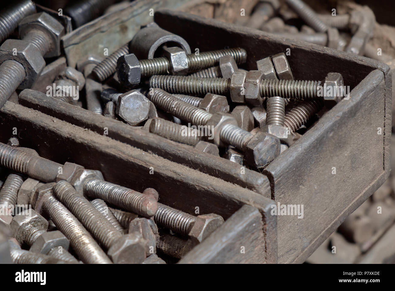 View of dirty nuts and bolts in the factory Stock Photo Alamy