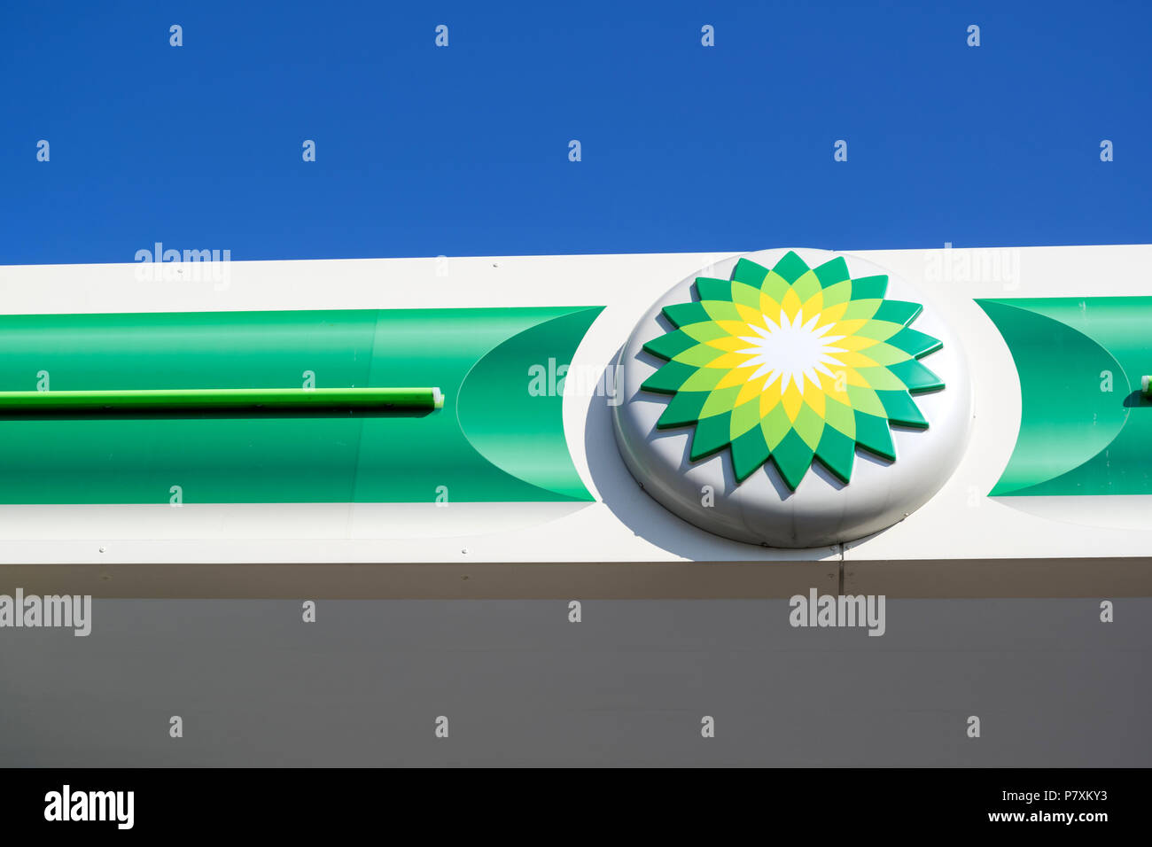 BP sign at gas station. BP is a British multinational oil and gas company headquartered in