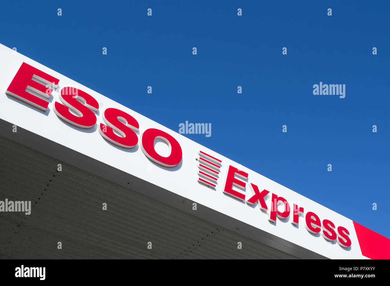 Esso Express lettering at gas station. Esso is ExxonMobil’s primary gasoline brand worldwide. Stock Photo