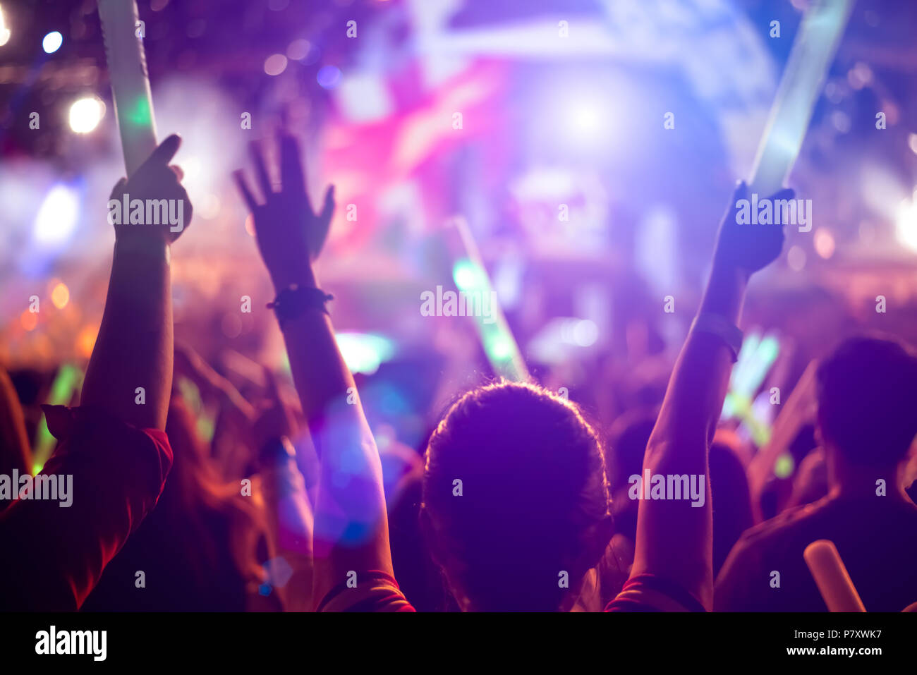 Rock concert party event. Music festival and Lighting stage concept. Youth and Fan club concept. People  and Lifestyle theme. Live stage show theme. Stock Photo