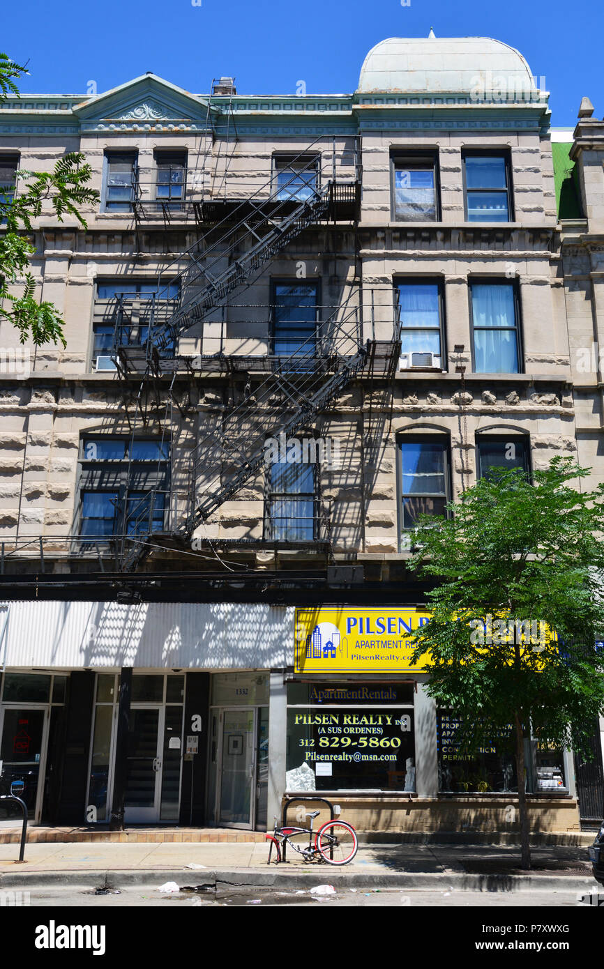 Apartments above a rental office on 18th Street in Chicago's Pilsen