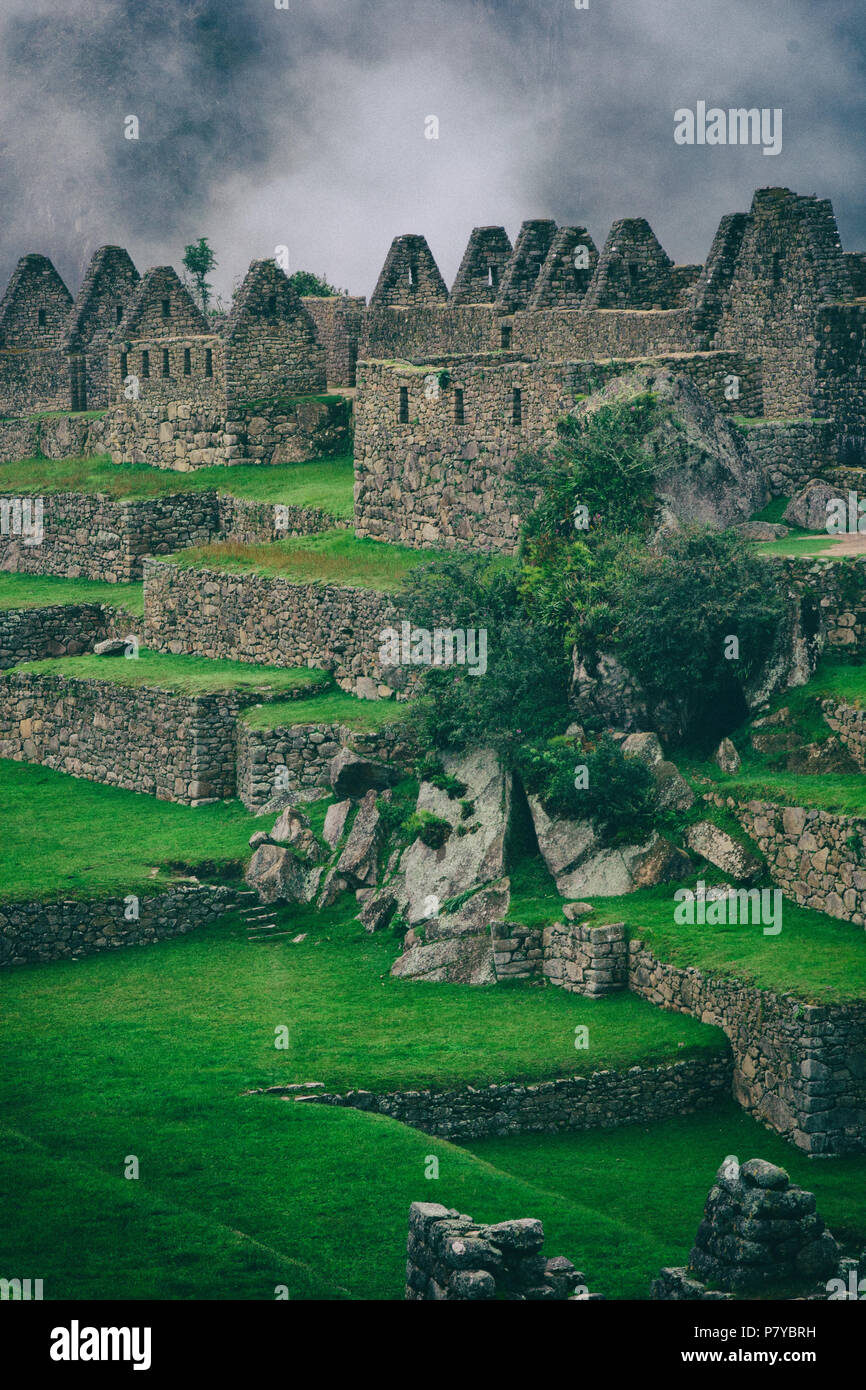 Beautiful view of clouds behind Machu Picchu ruins Stock Photo - Alamy