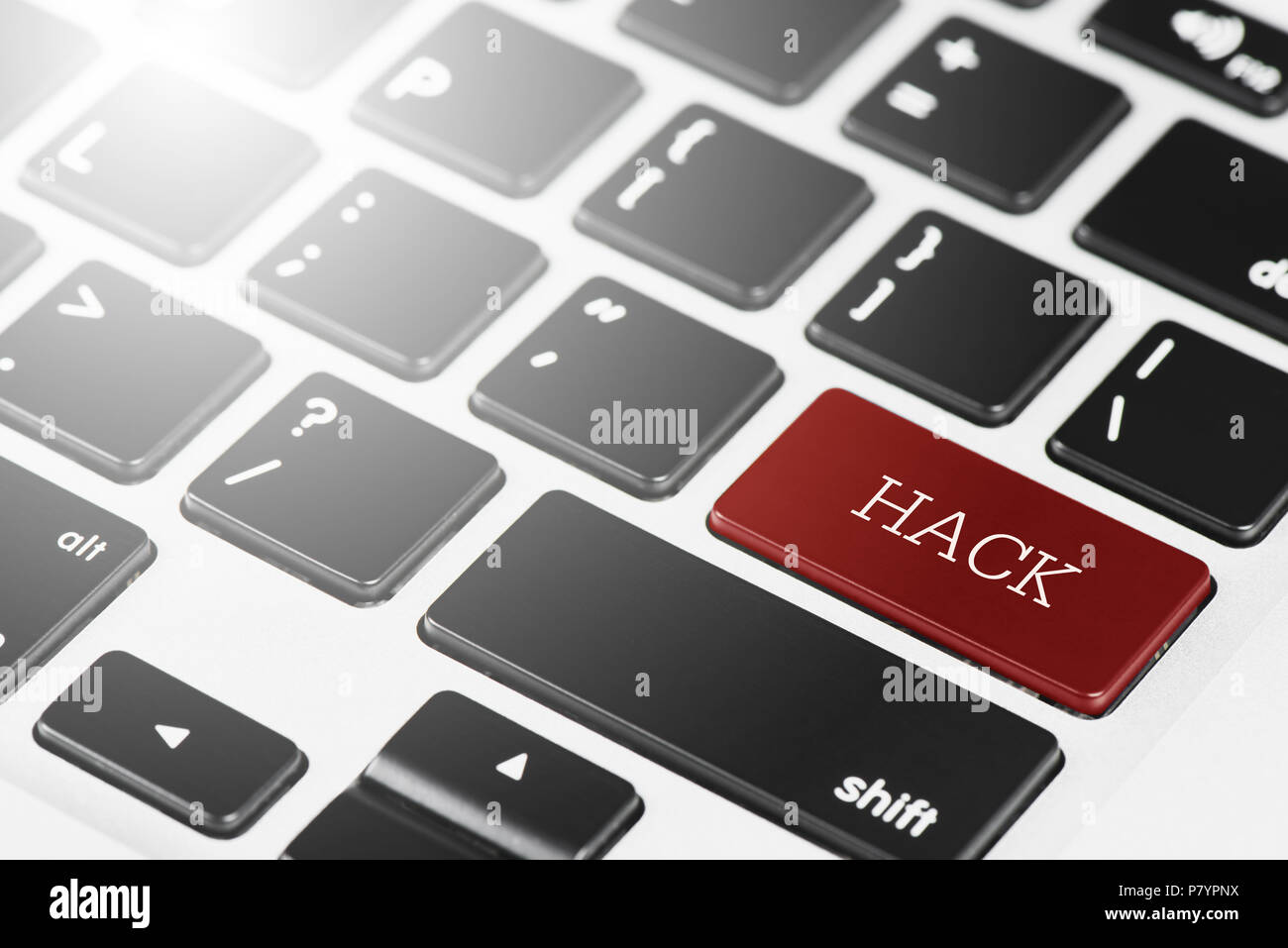 'HACK' Red button keyboard on laptop computer for Business and Technology concept Stock Photo