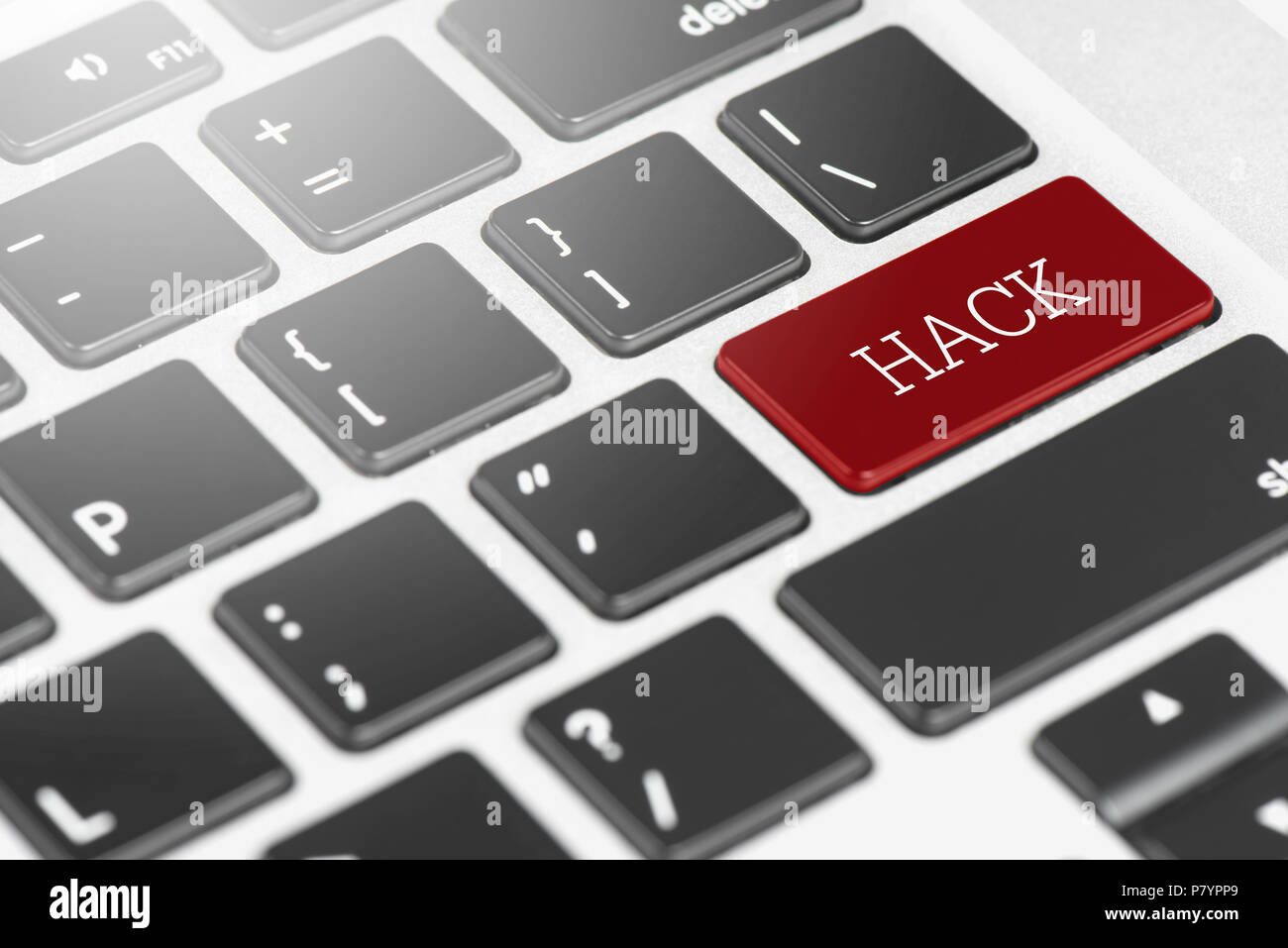 'HACK' Red button keyboard on laptop computer for Business and Technology concept Stock Photo