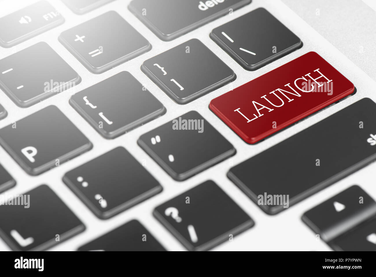 "LAUNCH" Red button keyboard on laptop computer for Business and Technology concept Stock Photo