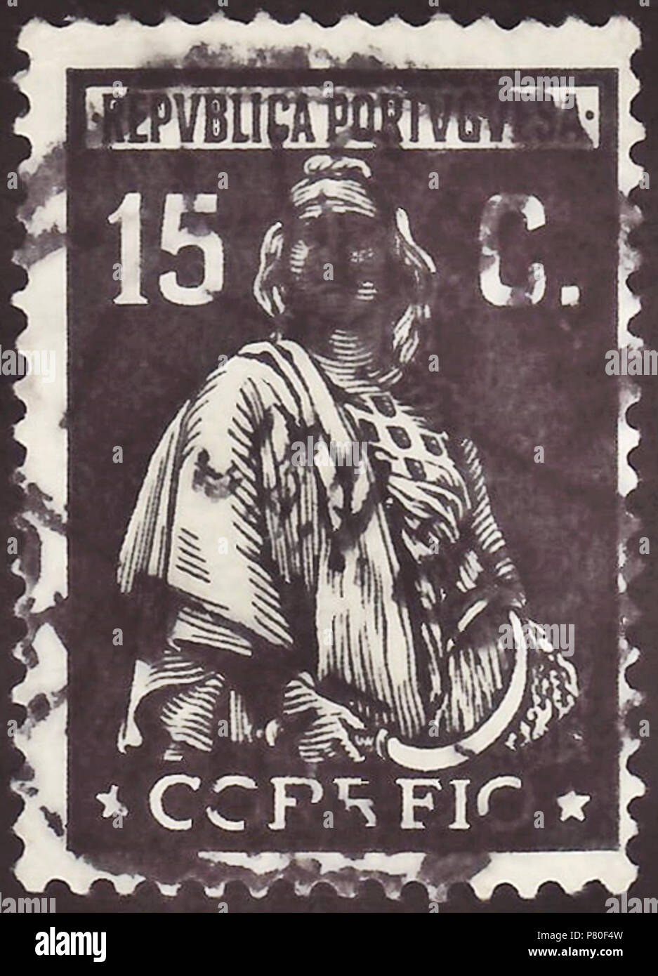 Stamp of Portugal; 1926; definitive stamp of the issue 'Ceres - 1st London issue'; new values and colors after the military coup in Portugal, 1926, printed in London (printery 'Thomas De La Rue & Company, Limited') according to the former design template; stamp drawing without signature line; stamp postmarked in 1928 Stamp: Michel: No. 412; Yvert et Tellier: No. 420; AFA: No. 414 Color: black on normal paper Watermark: none Nominal value: 15 C. (Centavos) Postage validity: from 2 December 1926 until 30 September 1945 Stamp picture size (printed area): 17.5 x 25.0 mm (no names line) . 2 Decembe Stock Photo