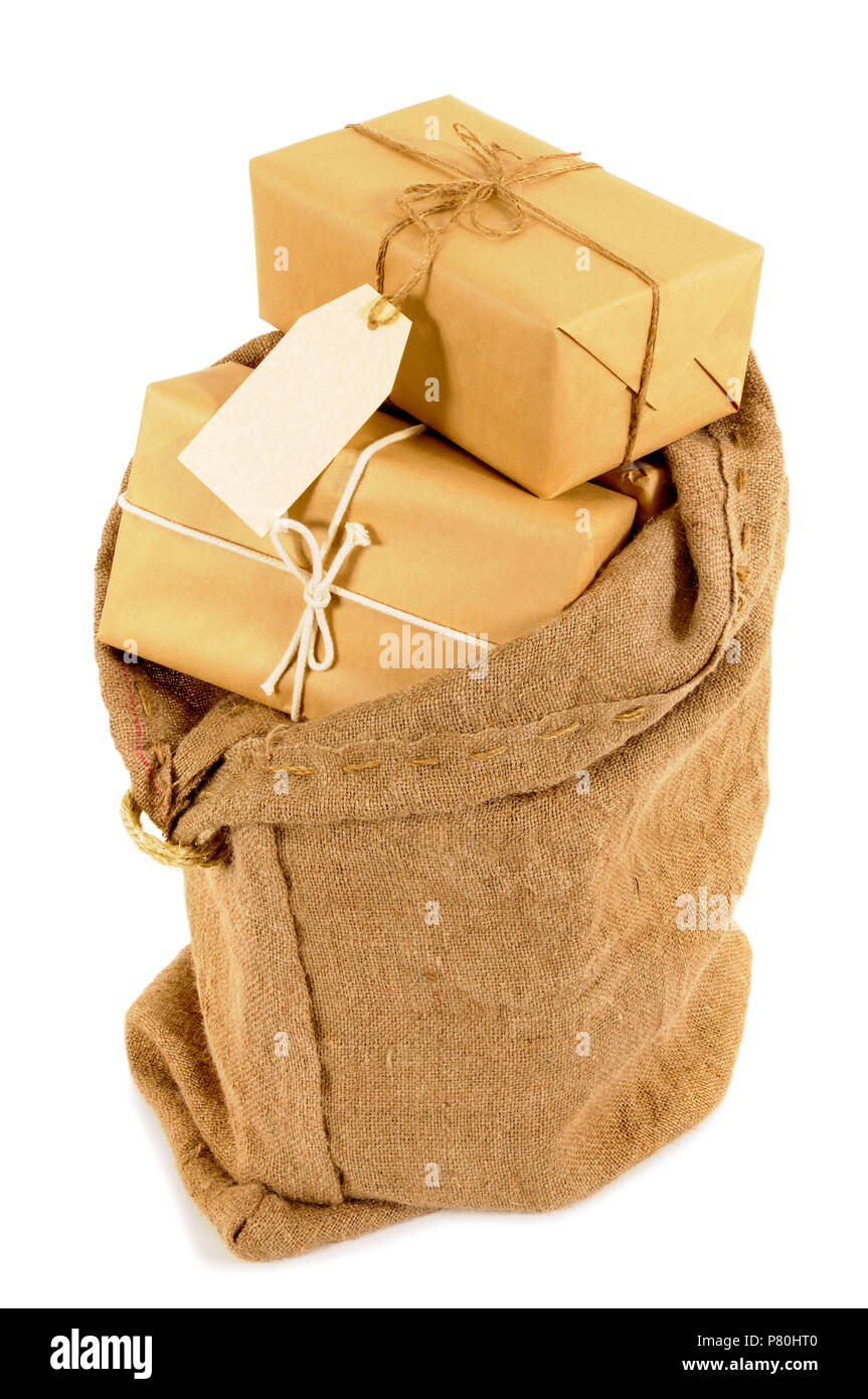 Mail bag filled with brown paper parcels Stock Photo Alamy
