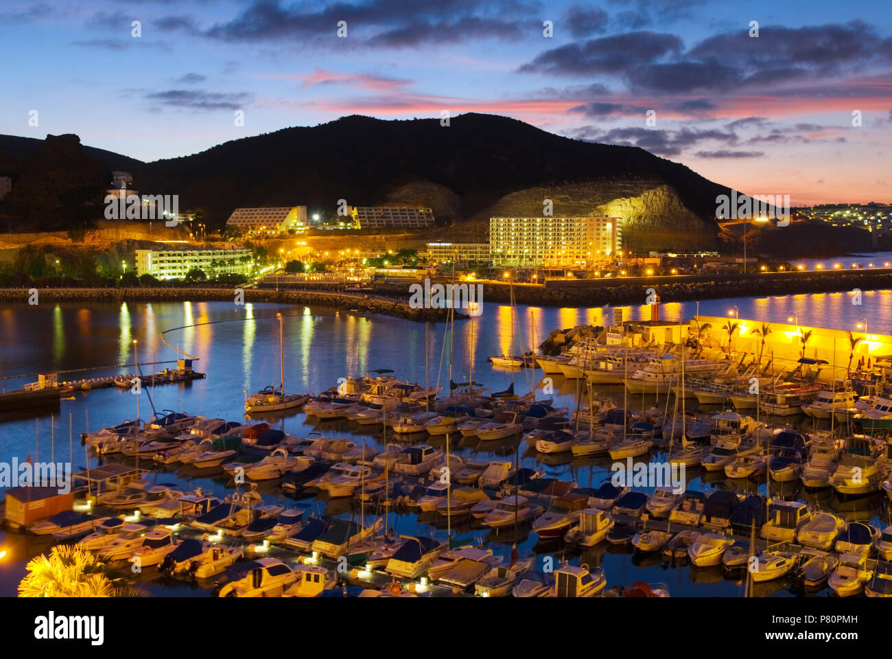 View over Marina of Puerto Rico on Gran Canaria island at dawn Stock Photo