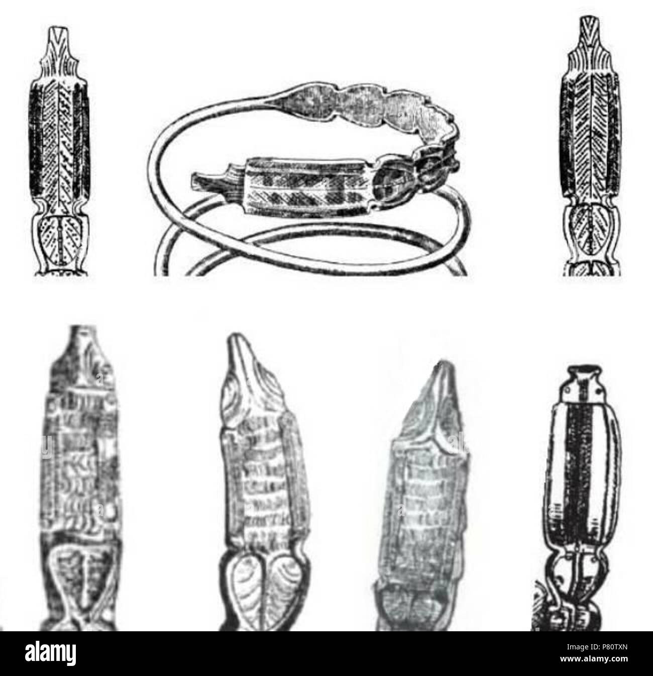 English: Dacian silver La Tene bracelet-ends (snake-heads) . 1888 and 1926 101 Dacian bracelet-ends snake-heads Stock Photo