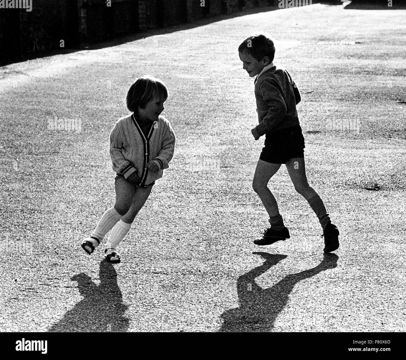 Brother and sister play together, England, Great Britain Stock Photo