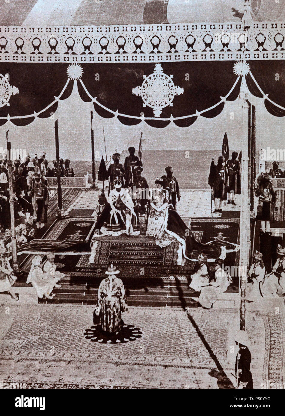 The Delhi Durbar of 1911, meaning 'Court of Delhi', was an Indian imperial style mass assembly organised by the British at Coronation Park, Delhi, India, to mark the succession of an Emperor or Empress of India. Also known as the Imperial Durbar, it was held three times, in 1877, 1903, and 1911, at the height of the British Empire. The 1911 Durbar was the only one that a sovereign, George V, attended.  The Nizam of Hyderabad pays homage to the Emperor and Empress at the Delhi Durbar, December 1911 Stock Photo