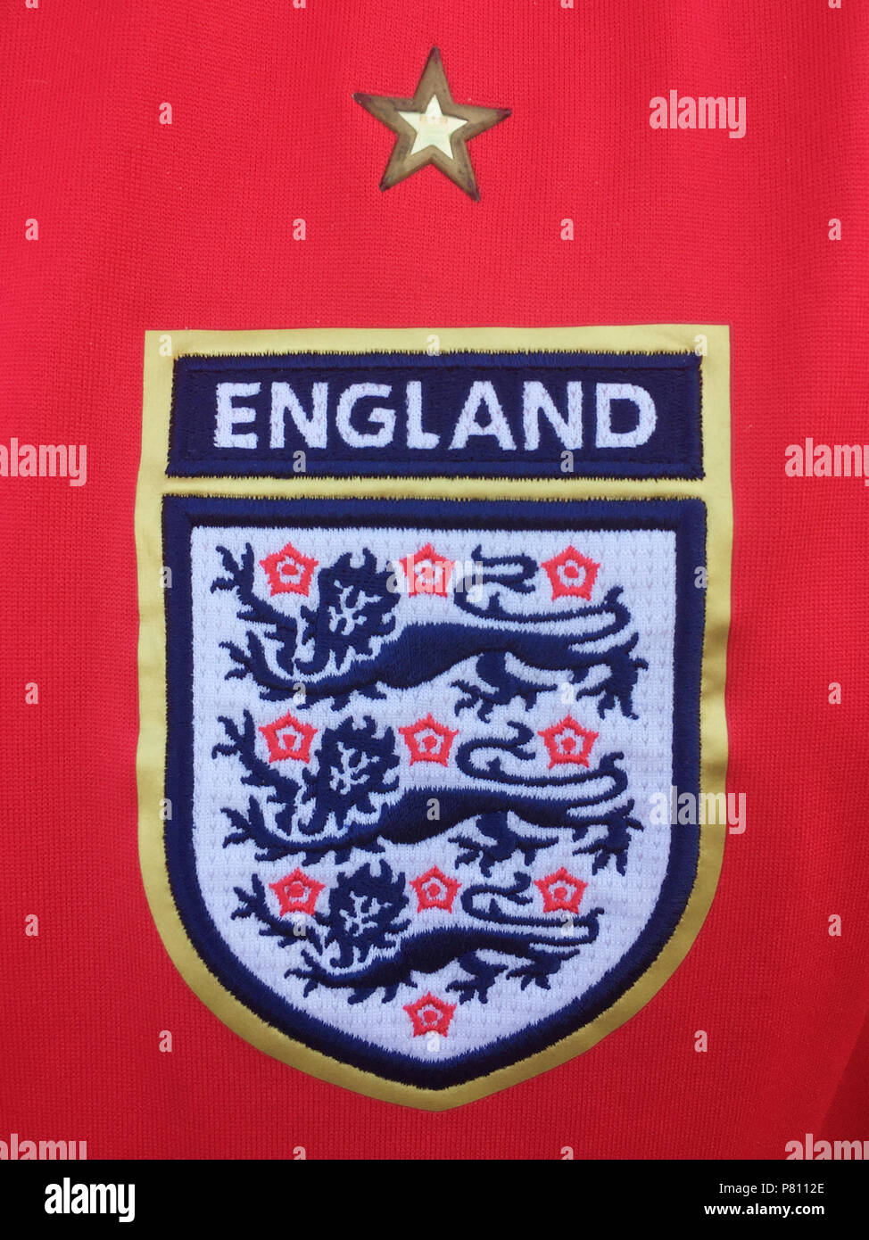 LONDON, UK - JULY 8th 2018: Red England national football shirt with the three lions emblem Stock Photo